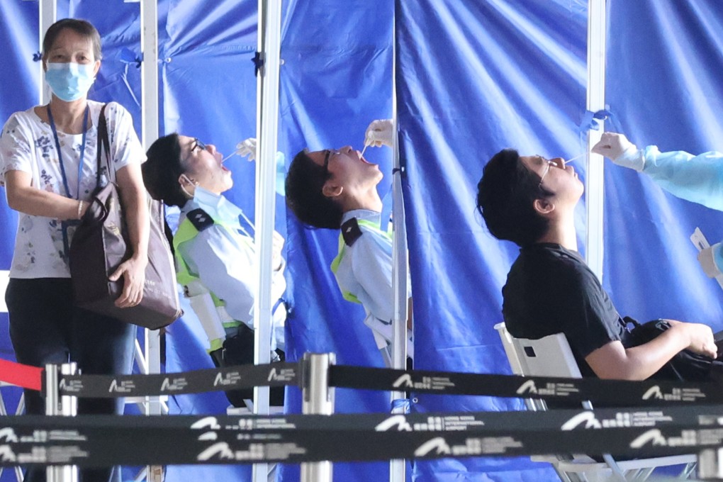 Airport staff undergo compulsory testing in late August. Photo: May Tse