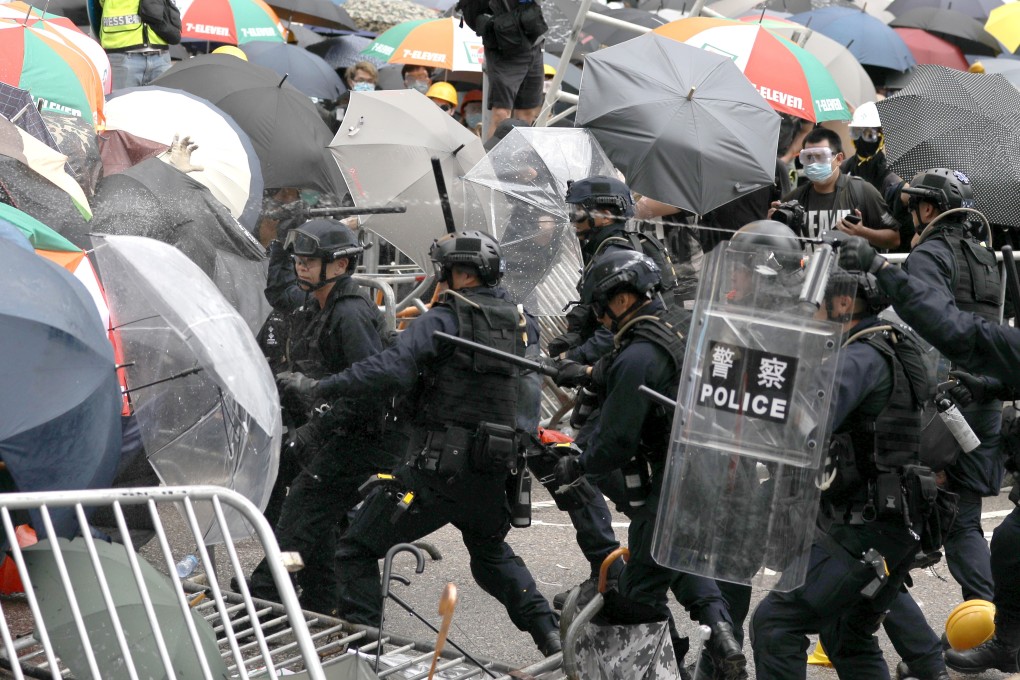 Police and protesters clash on Tim Wa Avenue in Admiralty on June 12, 2019. Photo: Sam Tsang