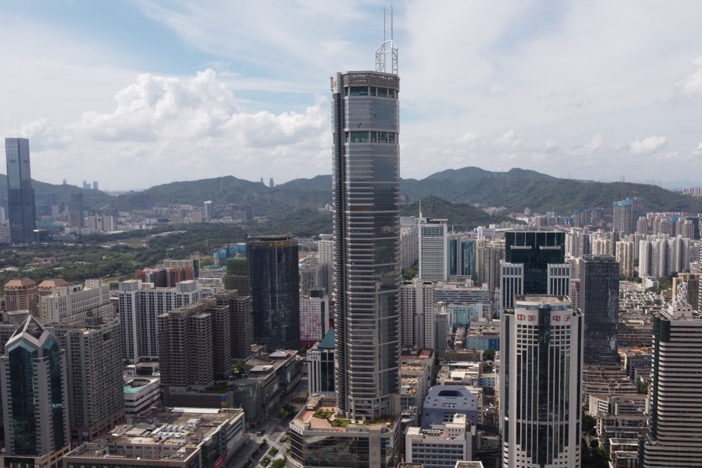 SEG Plaza standing at the Huaqiangbei area in Shenzhen on 20 May 2021. The pair of 60-metre masts blamed for causing the building’s tremors are visible on the rooftop in this photograph. Photo: Martin Chan