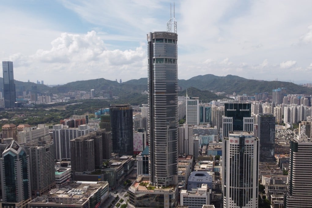 SEG Plaza standing at the Huaqiangbei area in Shenzhen on 20 May 2021. The pair of 60-metre masts blamed for causing the building’s tremors are visible on the rooftop in this photograph. Photo: Martin Chan