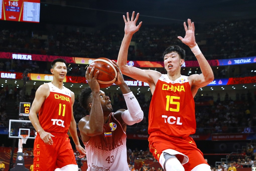 China's Zhou Qi (No 15) in action against Venezuela in the 2019 Fiba Basketball World Cup in China. Photo: Reuters