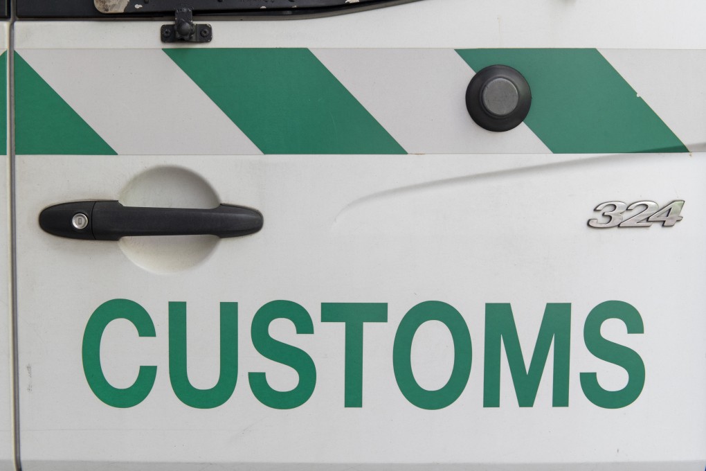 Hong Kong customs officers seized HK$712 million worth of black-market cigarettes. Photo: Warton Li