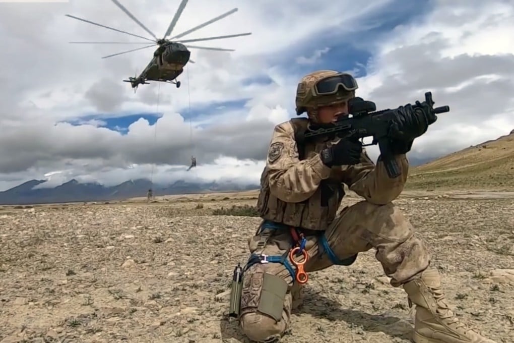 A screen shot from video shown on the PLA Daily website shows Chinese soldiers conducting a military drill in Tibet. Photo: Handout