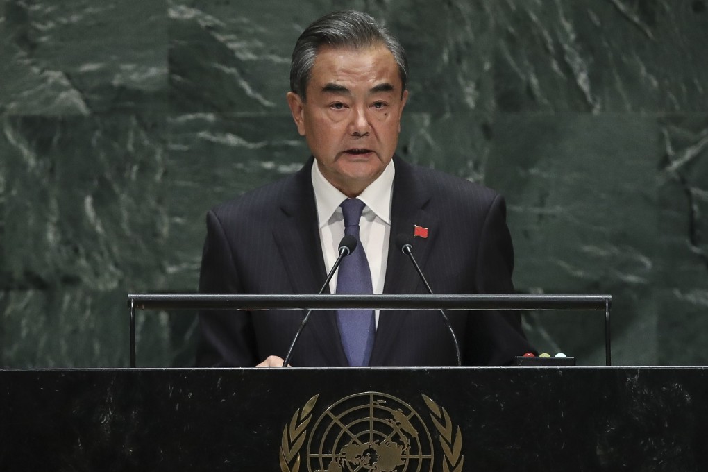 Chinese Foreign Minister Wang Yi says China will become a pillar of “an open world economy”. Photo: Getty Images/AFP