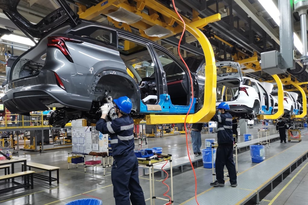 Employees work on the production line at Hefei Changan Automobile factory in Hefei in eastern Anhui province in February 2021. Photo: Xinhua