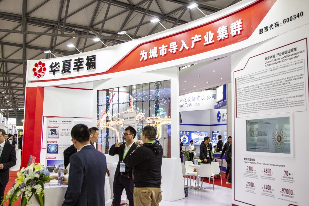 An exhibition booth showcasing China Fortune Land Development’s projects. The developer has become a financial burden on its major shareholders as it struggles to service its debt. Photo: Handout