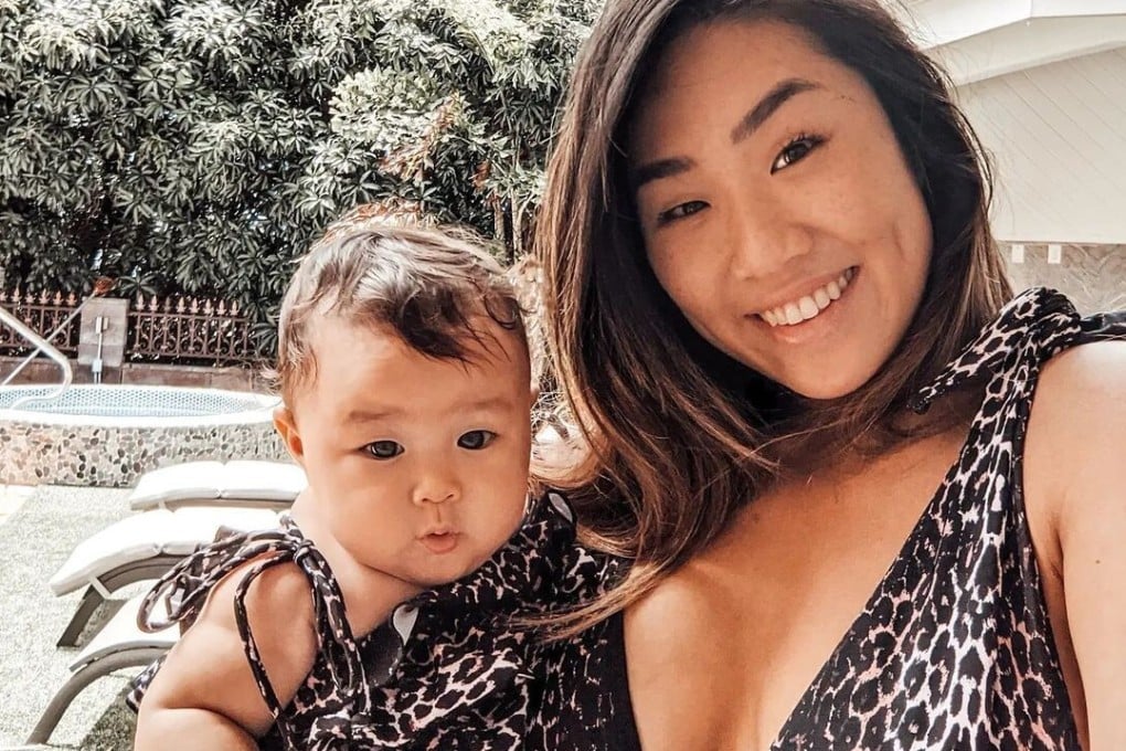 Angela Lee poses with her baby daughter. Photo: Instagram/@angelaleemma