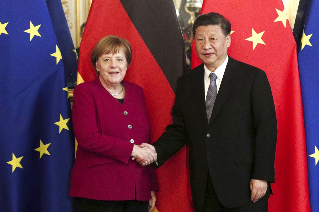 German Chancellor Angela Merkel and Chinese President Xi Jinping shake hands as they pose for photographs ahead of a bilateral meeting in Paris, France in March 2019. Photo: EPA-EFE