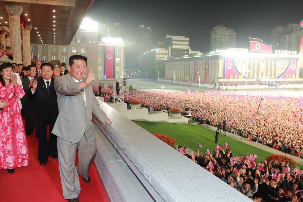 North Korean leader Kim Jong-un waves to the crowd during a military parade at Kim Il-sung Square to celebrate the 73rd anniversary of the country's founding. Photo: KCNA/DPA