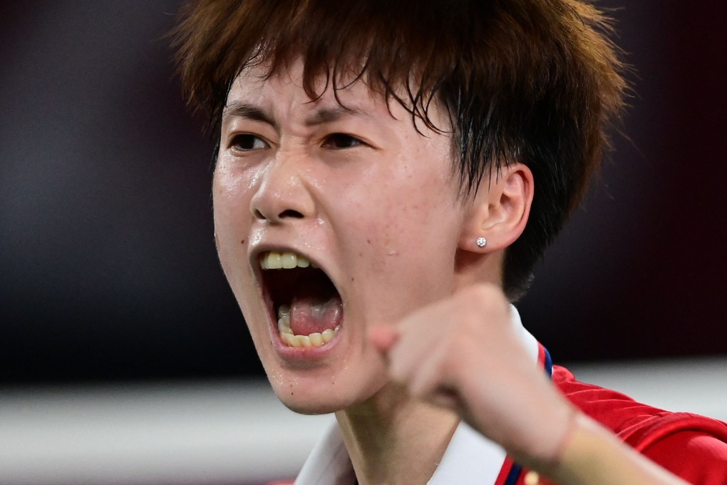 China's Chen Yufei reacts after a point won against Taiwan's Tai Tzu-ying in their women's singles badminton final match at the Tokyo 2020 Olympic Games. Photo: AFP
