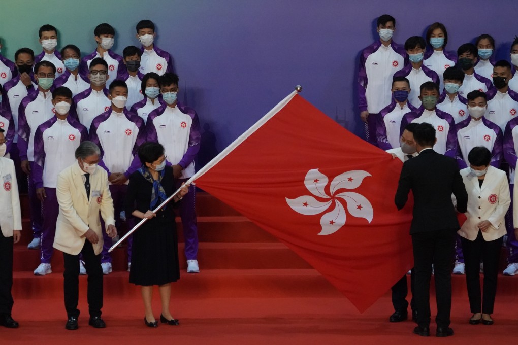 Chief Executive Carrie Lam Cheng Yuet-ngor officiates at the flag presentation for the Hong Kong Delegation to 14th National Games. Photo: Felix Wong