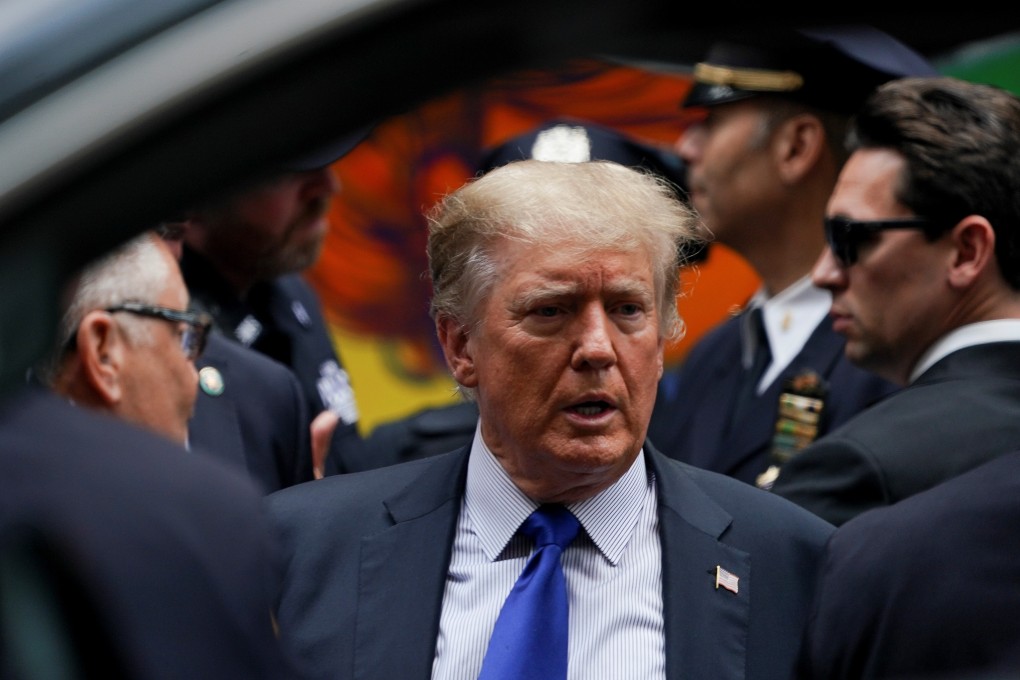Former US President Donald Trump visits the 17th Precinct of the New York City Police Department on Saturday. Photo: Reuters.
