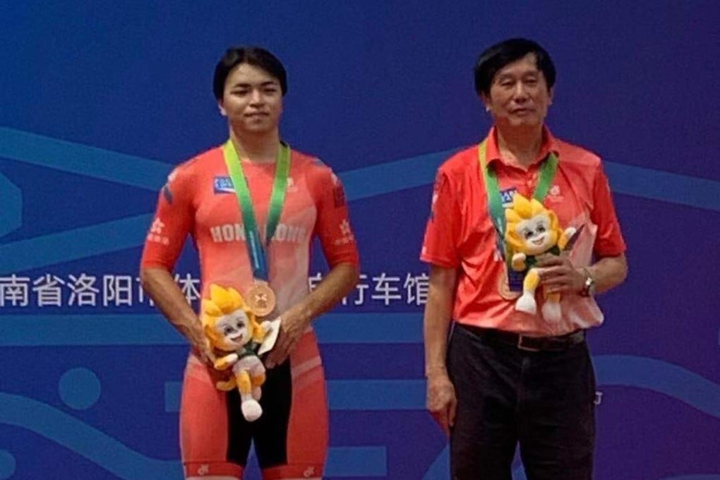 Leung Ka-yu, left, on the medal podium, the first for Hong Kong at the 14th National Games with coach Shen Jinkang. Photo: Cycling Association