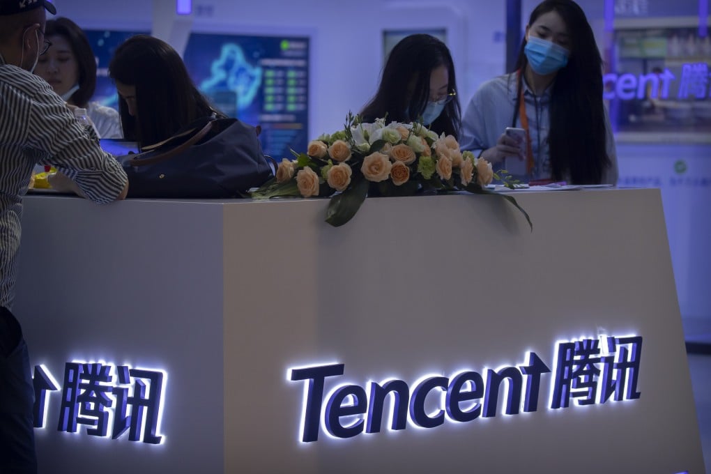 Visitors gather at a display booth for Chinese technology firm Tencent at the China International Fair for Trade in Services (CIFTIS) in Beijing on Sept. 5, 2020. Photo: AP