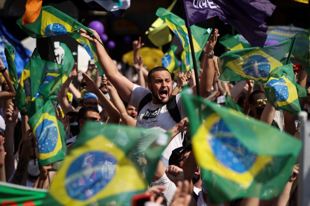 People gather in Sao Paulo, Brazil on Sunday for a day of demonstrations against the government of President Jair Bolsonaro. Photo: EPA-EFE