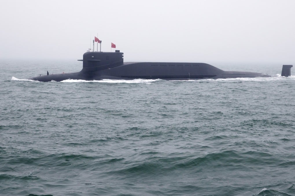 Japan claims to be monitoring a Chinese submarine along the edge of its territorial waters. Pictured is a type 094 Jin-class nuclear submarine Long March 15 of the Chinese People’s Liberation Army, taking part in an parade near Qingdao, in eastern China’s Shandong province in 2019. Photo: AFP