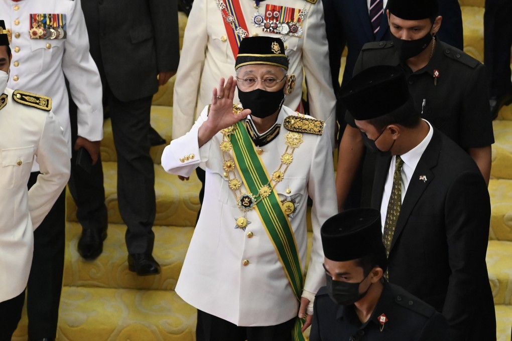 Malaysia’s Prime Minister Ismail Sabri, centre, waves during the opening of parliament in Kuala Lumpur on Monday. Photo: Malaysia’s Department of Information Handout via EPA