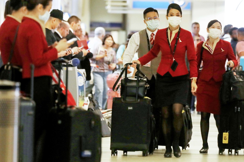 Cathay Pacific has been warned regarding its decision to sack some aircrew who have not yet been vaccinated against Covid-19. Photo: AFP