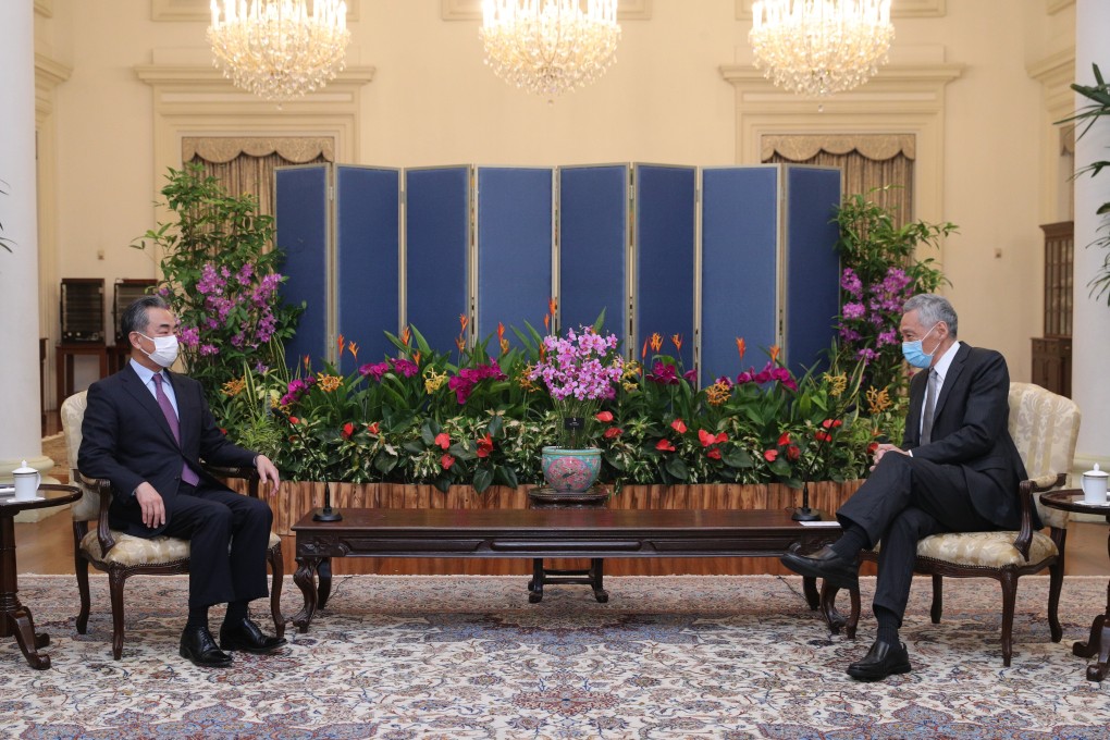 Chinese Foreign Minister Wang Yi meets Singapore’s Prime Minister Lee Hsien Loong at the Istana, or Presidential Palace, in Singapore. Photo: EPA