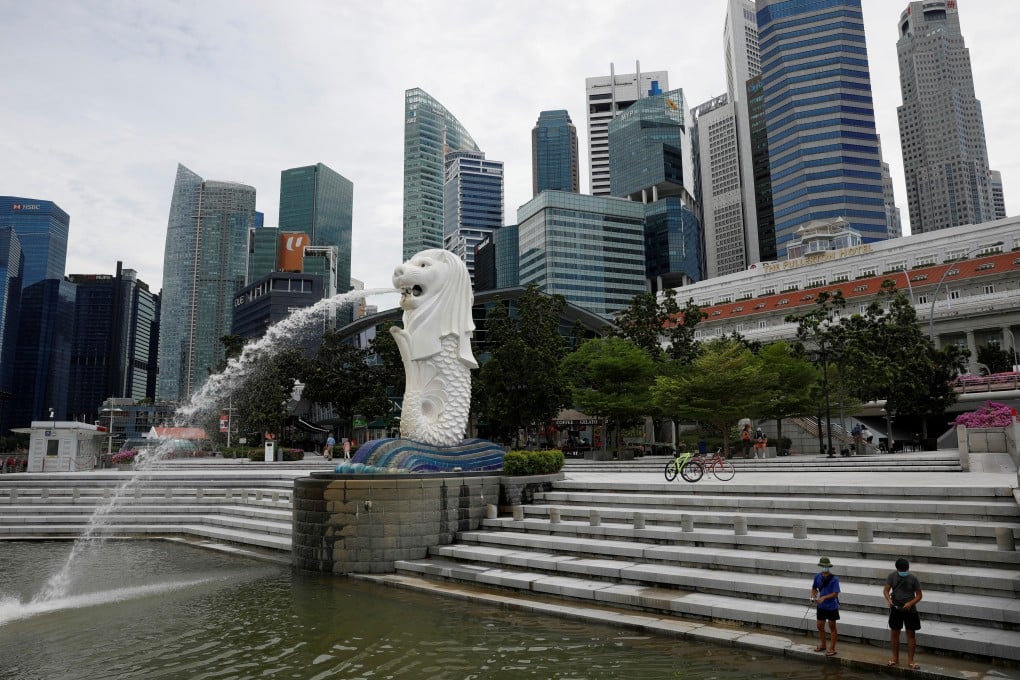 China’s embassy in Singapore said ‘dozens’ of citizens have been infected with Covid-19 while in the city state. Photo: Reuters