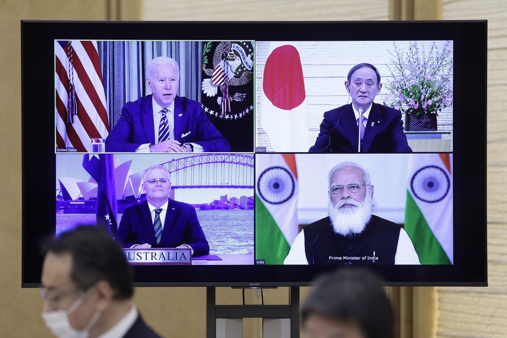 Taking part in a virtual Quad summit are (clockwise from top left) US President Joe Biden, and the prime ministers of Japan, India and Australia, Yoshihide Suga, Narendra Modi and Scott Morrison, respectively, on March 12. Photo: Bloomberg