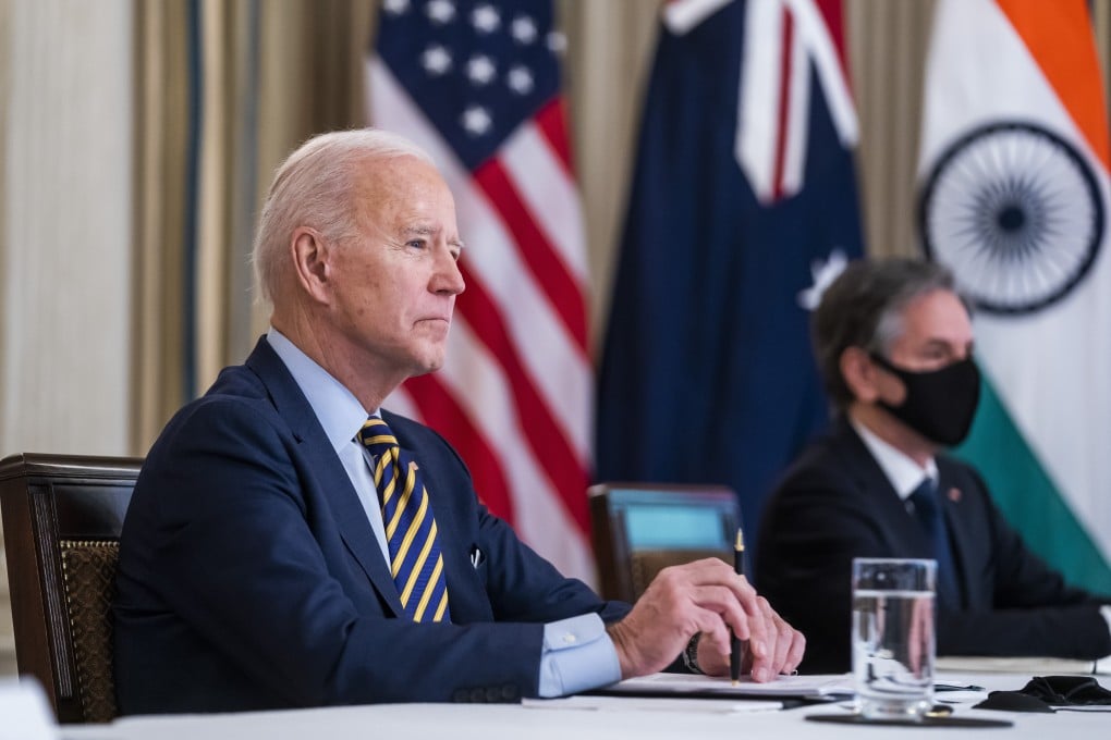 US President Joe Biden and Secretary of State Antony Blinken (right) listen during a virtual Quad meeting with leaders of Japan, Australia and India on March 12. The countries’ four leaders will meet at the White House on September 24. Photo: EPA/Bloomberg