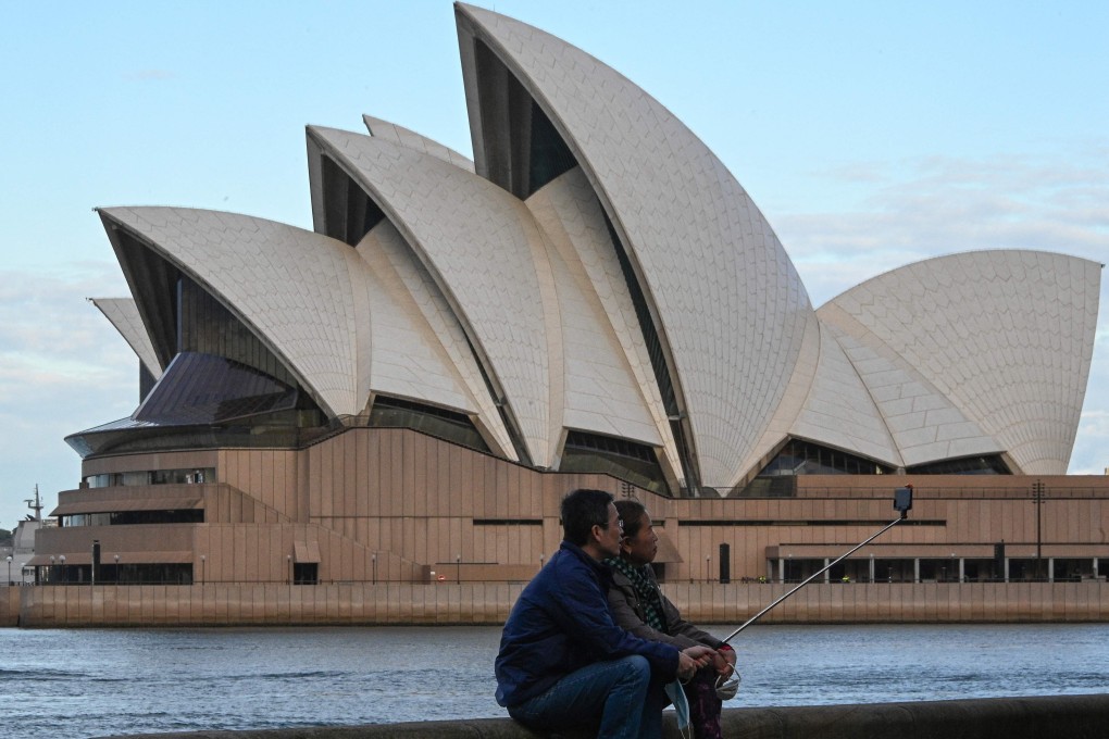 Sydney’s curfew in Covid-19 hotspots will end as cases stabilise, with authorities saying many restrictions will lift when 70 per cent of the city’s residents are fully vaccinated, sometime in October. Photo: AFP