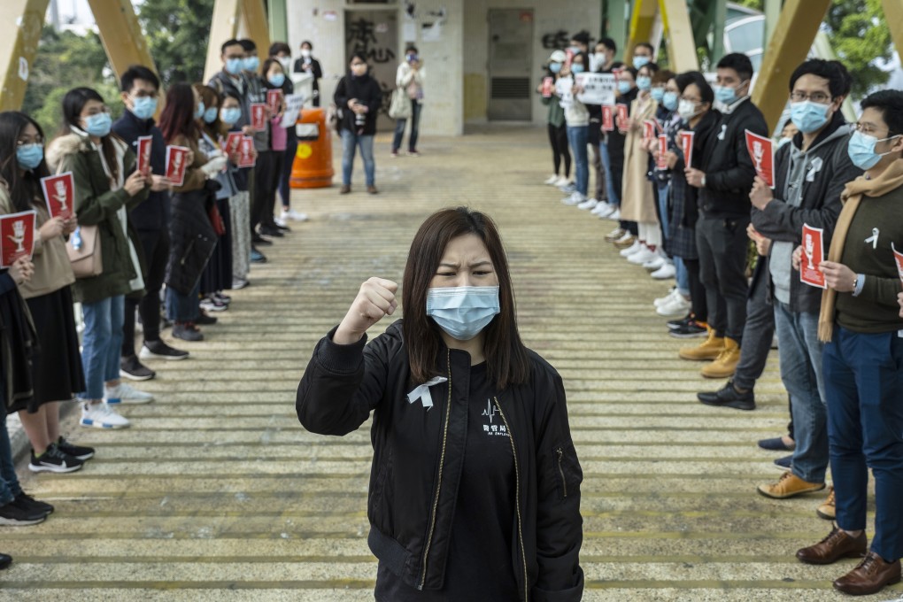 Members of the Hospital Authority Employees Alliance stage a protest outside Queen Mary Hospital in Pok Fu Lam in February last year. Then chairwoman Winnie Yu stands at the centre. Photo: Bloomberg