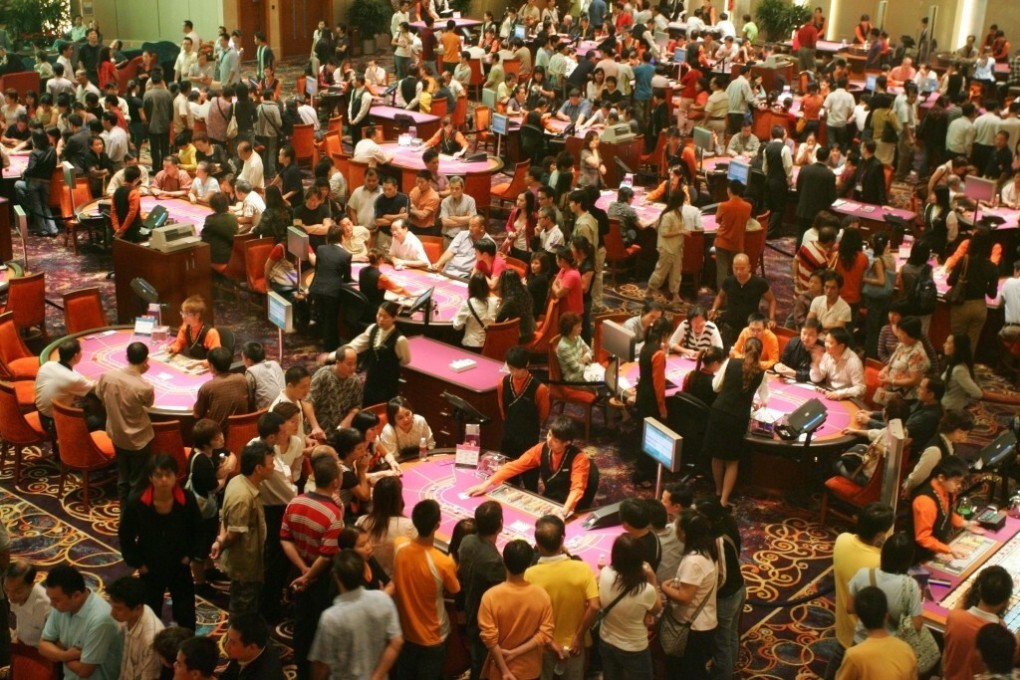 Gamblers in the main mass-market gambling floor during the opening weekend of Galaxy Entertainment’s HK$3 billion StarWorld casino in Macau on October 19, 2006. Photo: Handout