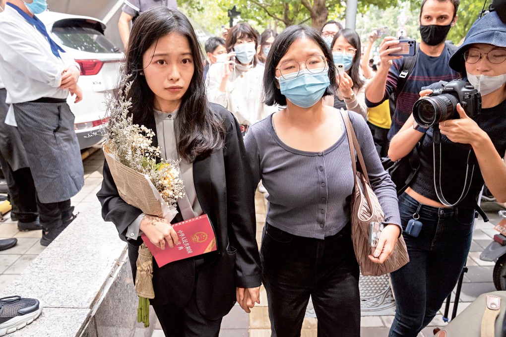 Zhou Xiaoxuan (left) arrives for the court hearing in Beijing on Tuesday. Photo: AP
