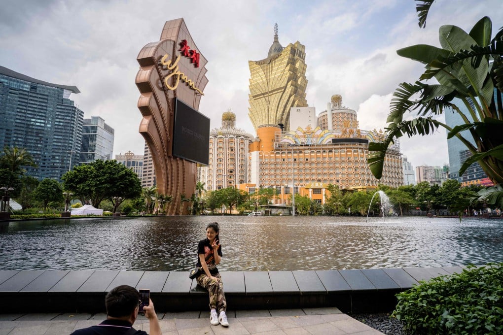 A March 2019 picture showing visitors outside the Wynn casino resort in Macau. Regulatory risks continue to hammer investors as China is seen tightening its grip on the gambling hub. Photo: AFP