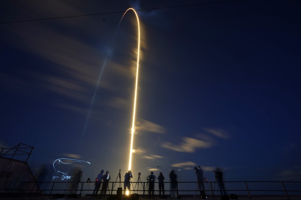 A SpaceX Falcon 9 rocket, with four private citizens onboard, lifts off from Kennedy Space Centre. Photo: AP