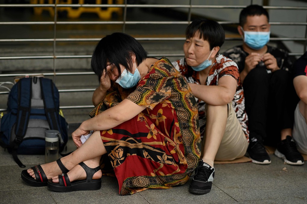 Investors of a wealth management product sold by China Evergrande Group held a sit-in protest at the company’s headquarters in Shenzhen on September 16, 2021. Evergrande said it was facing “unprecedented difficulties" but denied it was about to go under. Photo: AFP
