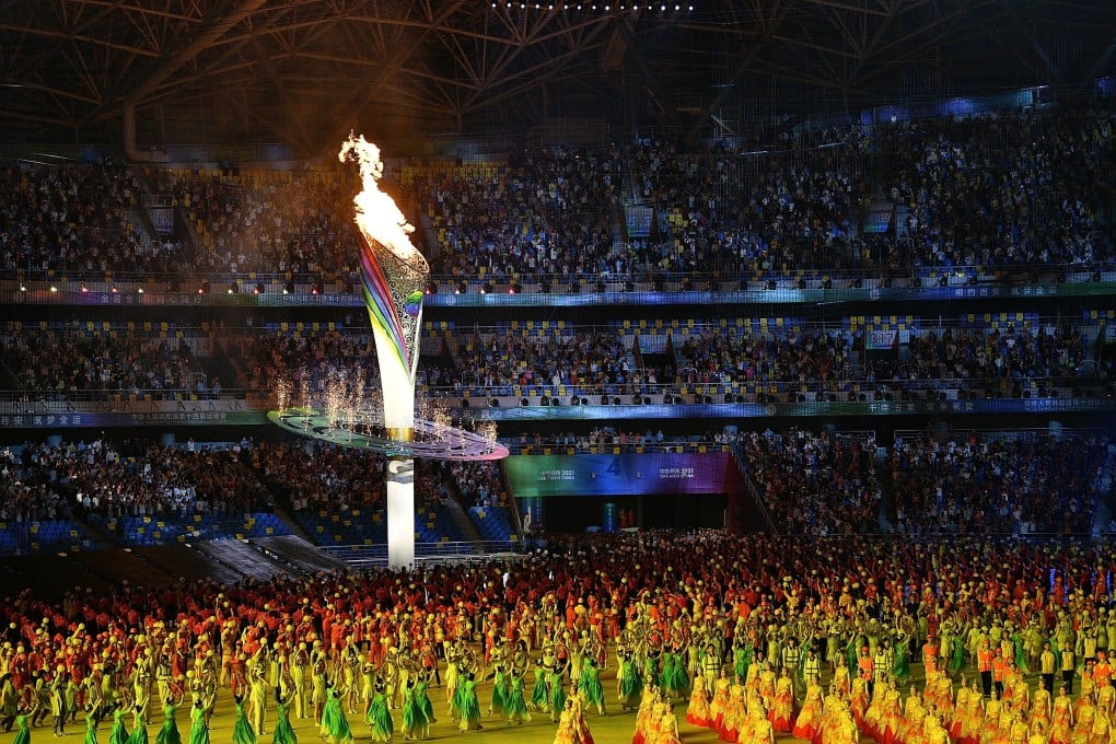 The flame of the 14th National Games is lit during the opening ceremony in Xian. Photo: Xinhua