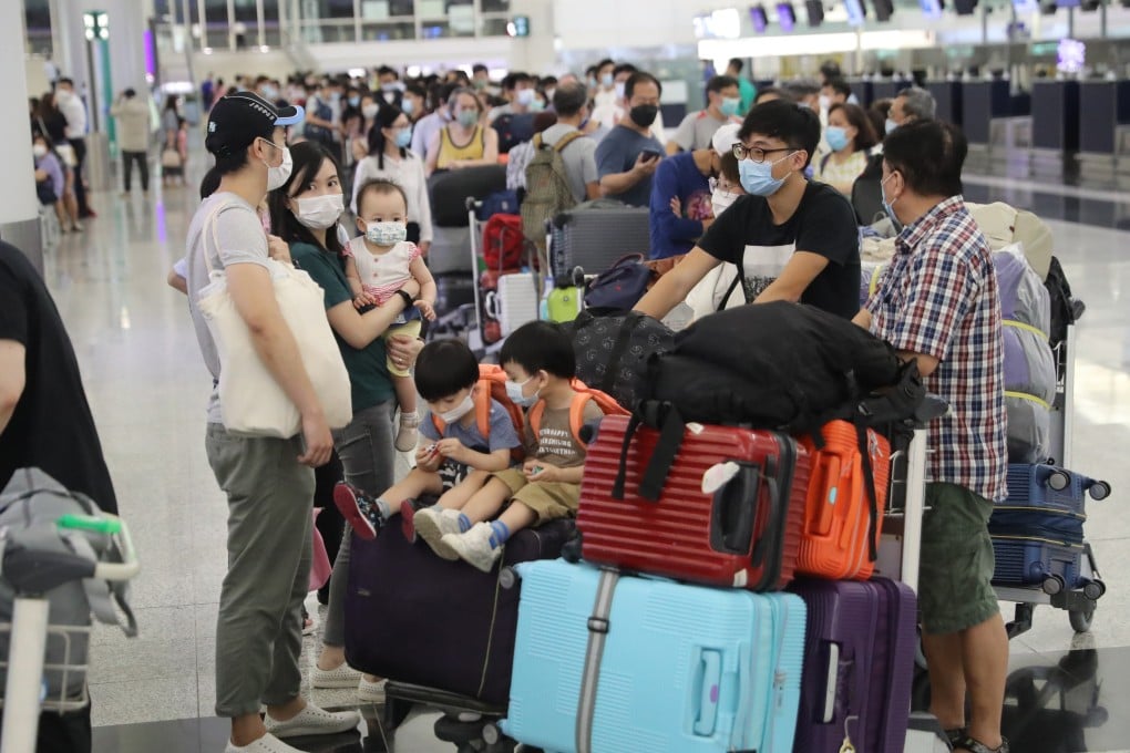 Passengers wait at check-in counters at Hong Kong International Airport. Photo: Edmond So