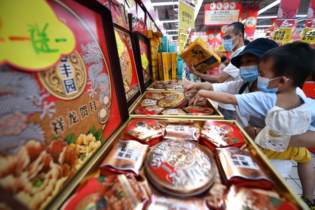 Customers buy mooncakes ahead of the 2020 Mid-Autumn Festival in Shanghai. Concerns about a recent Covid-19 outbreak have dampened the celebratory mood. Photo: Xinhua