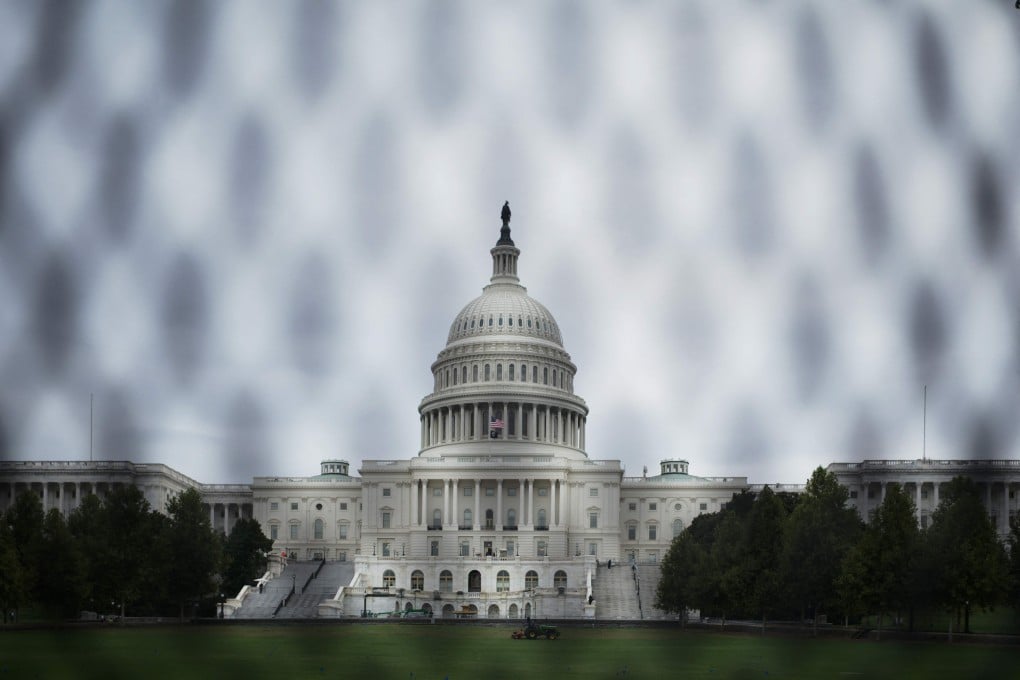 Security crews are using a chain-link fence around the US Capitol building to deter another riot like the one January 6. Photo: AFP