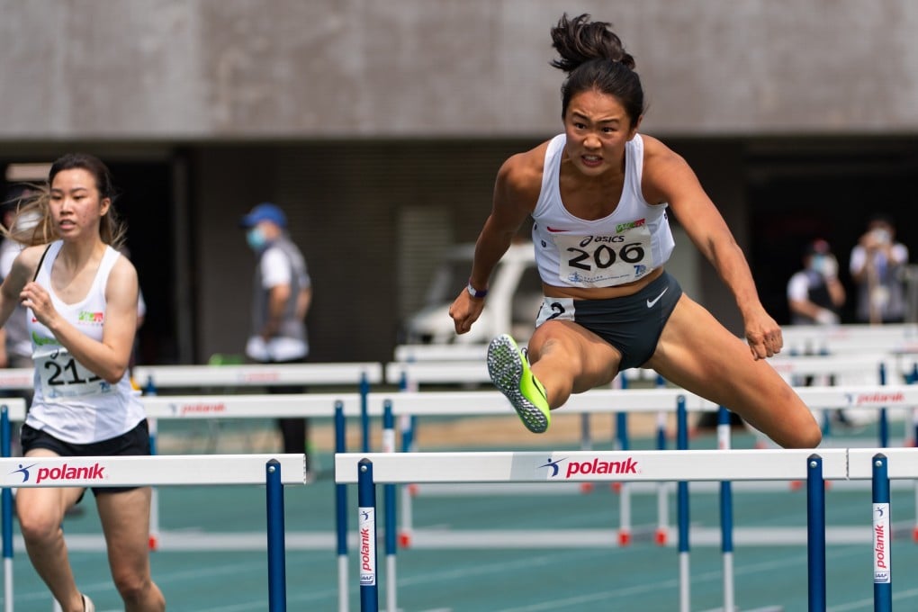 Vera Lui clears the hurdles on her way of winning the 100m women’s hurdles at the 2021 Athletics Series 1 at Tseung Kwan O Sports Ground in March. Photo: HKAAA