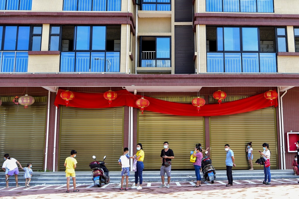 Residents wait in line to receive nucleic acid testing in Xianyou county of Putian, in southeast China’s Fujian province on Thursday. Photo: Xinhua