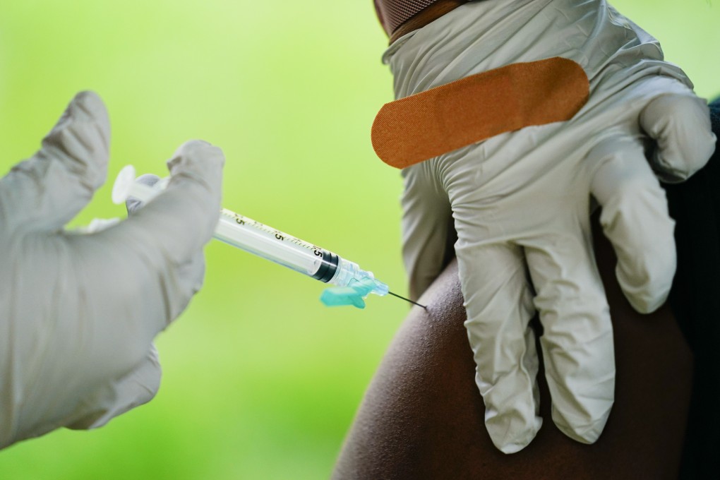 A health worker administers a dose of the Pfizer Covid-19 vaccine in Reading, Pennsylvania, on Tuesday. Photo: AP