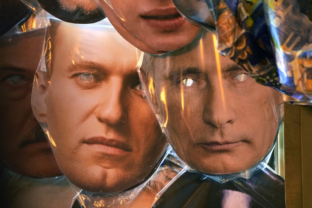 Face masks depicting Russian President Vladimir Putin (right) and jailed Russian opposition leader Alexei Navalny were among others on sale at a souvenir shop in St. Petersburg on September 8. Photo: AP