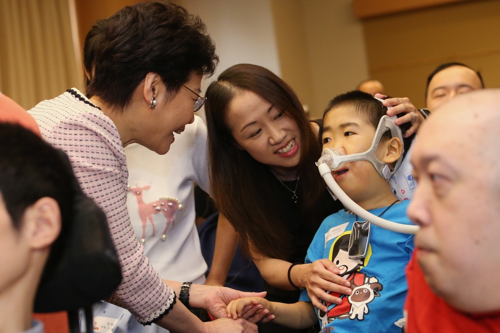 Chief Executive Carrie Lam (left) chats with Marcus Ng at an event in 2018. Photo: David Wong