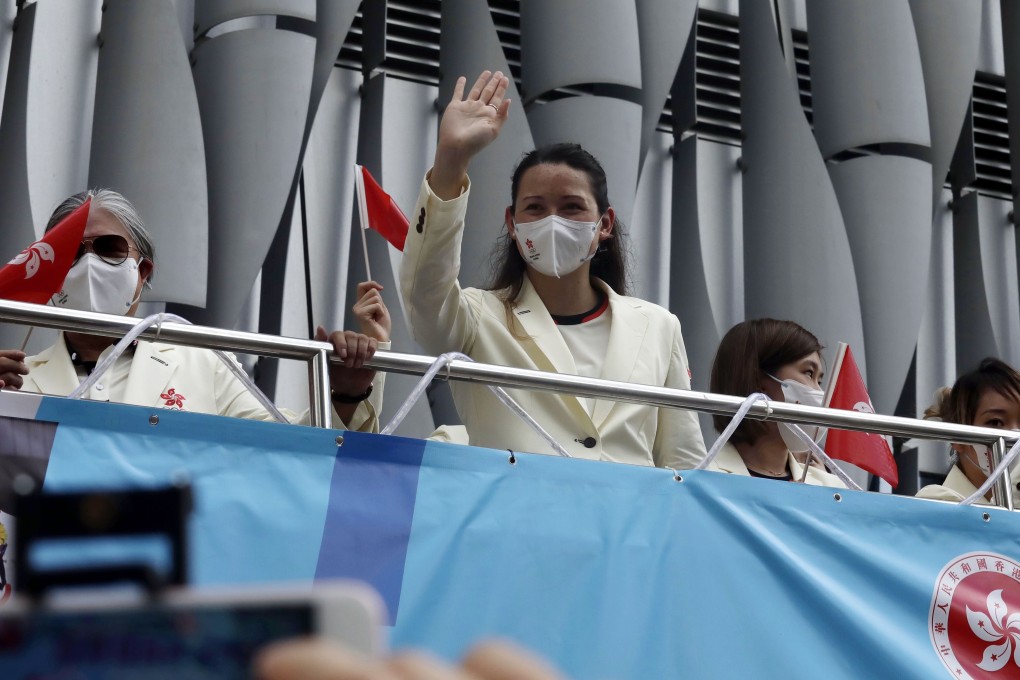 Swimmer Siobhan Haughey waves during a parade for the Hong Kong Tokyo 2020 Olympic Games delegation. Photo: Jonathan Wong