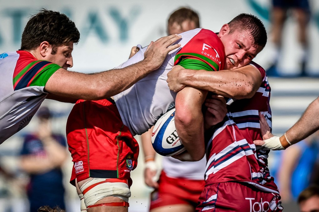 Sandy Bay captain Lewis Wilson gets a grip on the new HKRU Premiership season. Photos: Ike Li