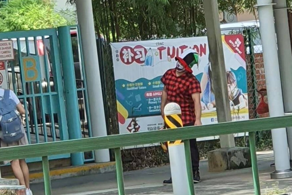 A clown seen at outside a primary school in Singapore. Photo: Facebook