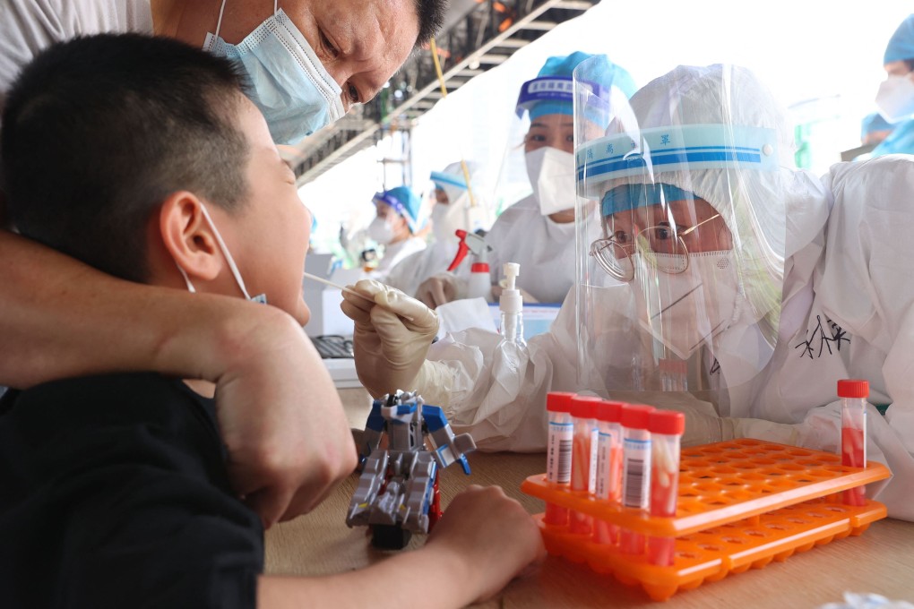 A child is tested for Covid-19 in Xiamen, one of three cities affected by an outbreak of the Delta variant in Fujian province. Photo: AFP