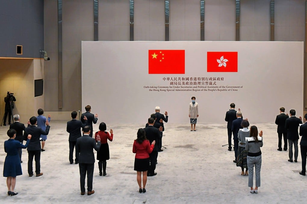 Hong Kong civil servants pledge their allegiance to the city in front of Chief Executive Carrie Lam. Photo: Handout