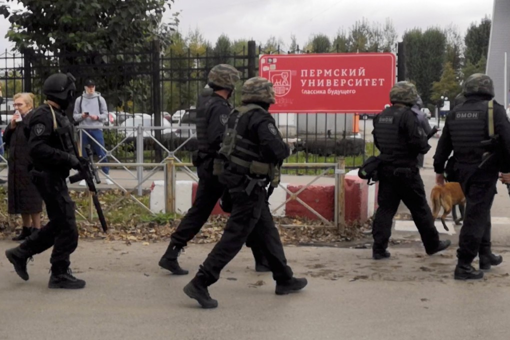 Law enforcement officers at Perm State University after a shooting. Photo: Reuters