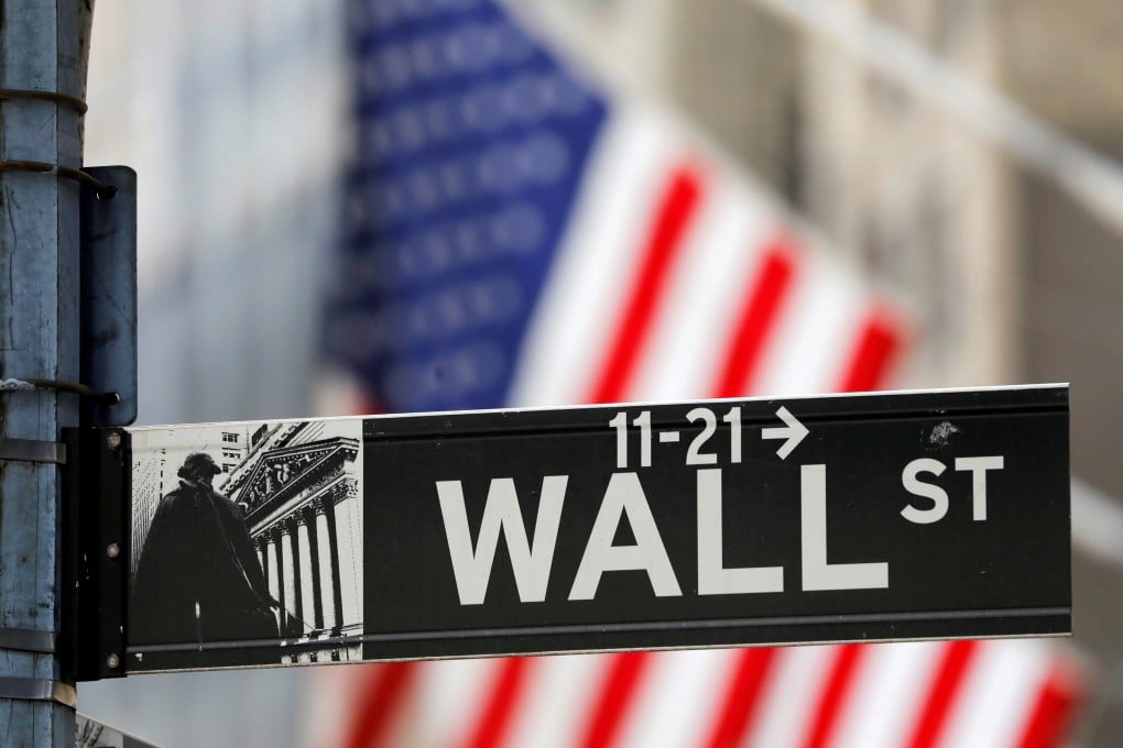 A street sign for Wall Street is seen outside the New York Stock Exchange in July. Photo: Reuters