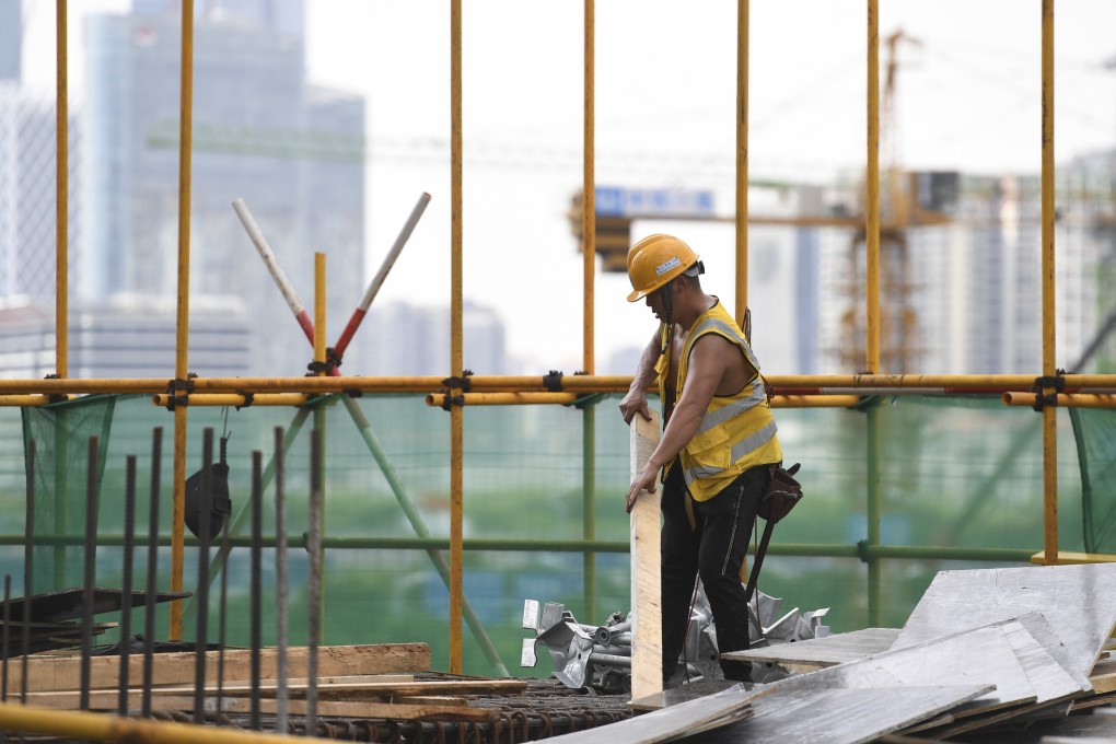 A transaction centre goes up in Qianhai in Shenzhen. Photo: Xinhua